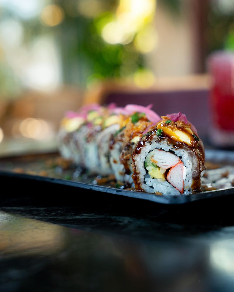 Signature sushi roll close-up at Al Hayat
